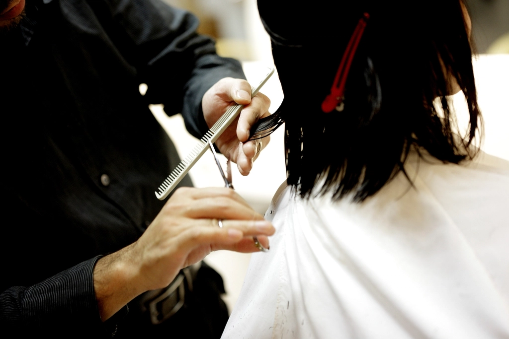 a stylist at The Cutting Room, Manchester